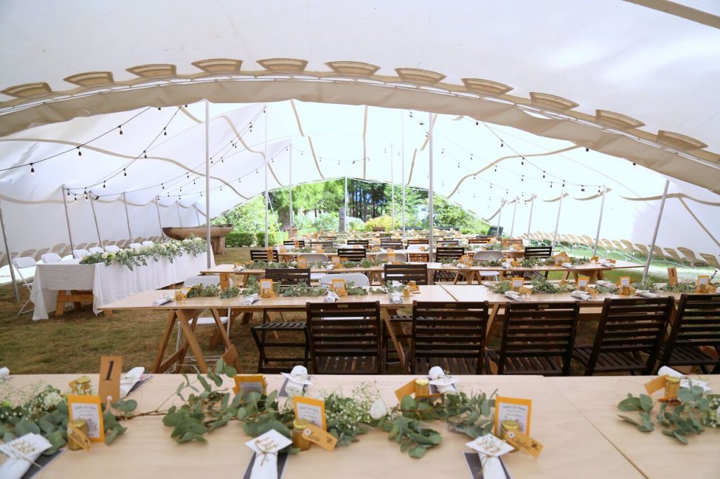 Large Wedding Reception Under White Stretch Tent